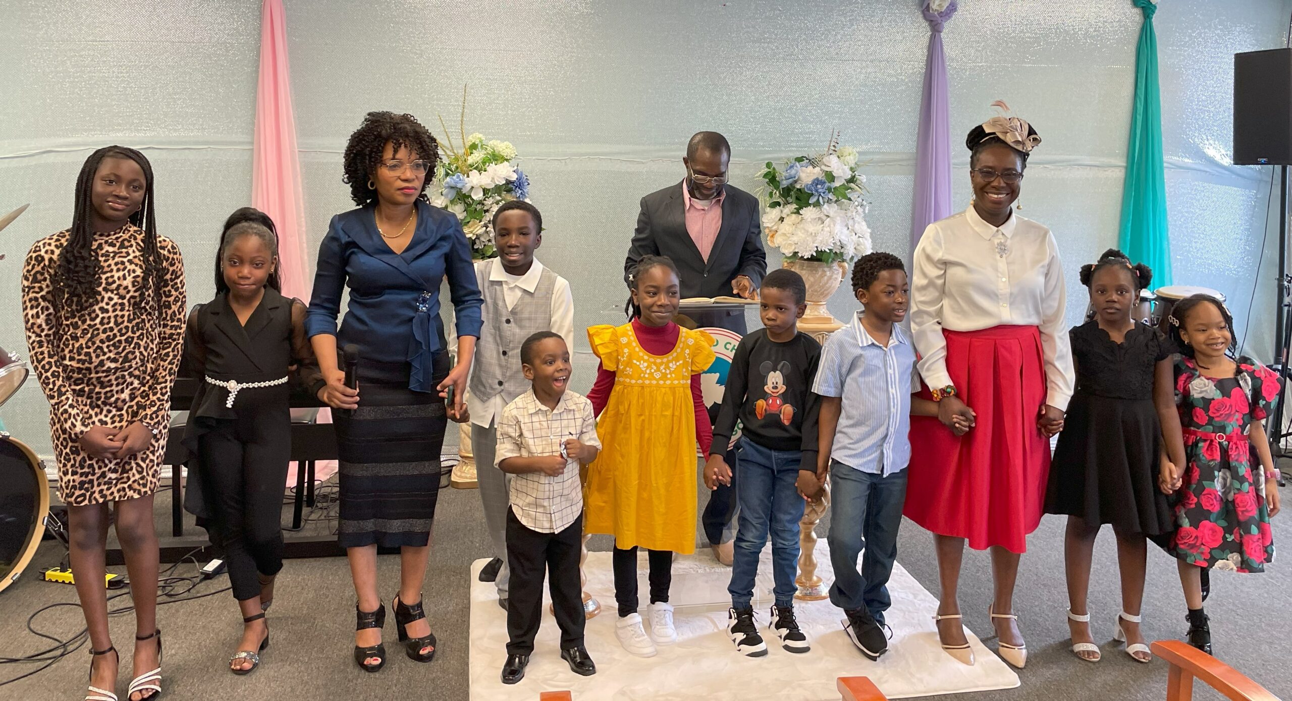 Solution center Children group posing for a picture during bible verse presentation